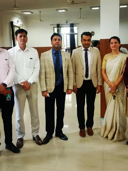 A group photo with fellow advocates at a formal event.
