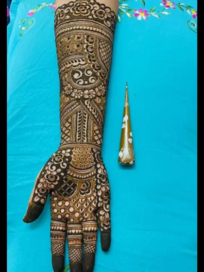 Quality and safety are everything to me. I use only my own handmade, organic henna cones, like the one pictured here, ensuring a beautiful design and a safe, chemical-free experience.