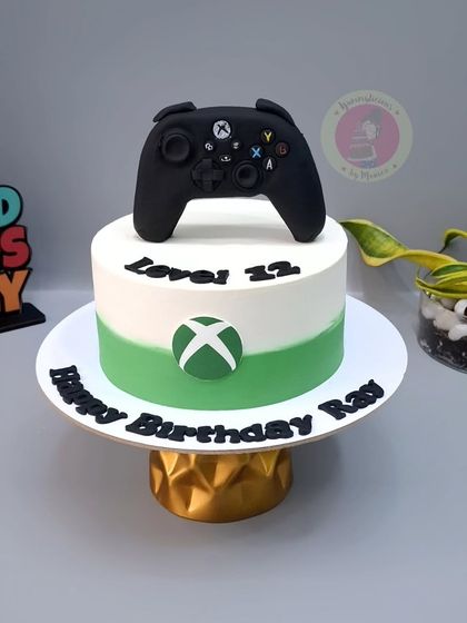 A clean and simple Xbox-themed cake for a gamer's 12th birthday.