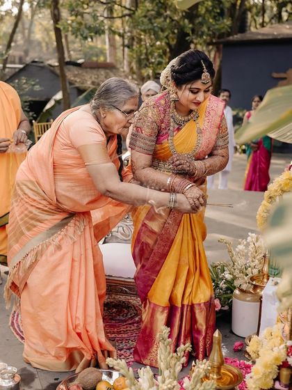 A heartwarming moment between the bride and her grandmother during the wedding preparations. We believe in honoring family bonds and creating space for these precious interactions.