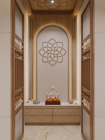 I design custom pooja units that integrate seamlessly into modern homes. This example features an arched niche with soft backlighting, a geometric mandala motif, and traditional latticework doors, creating a peaceful and sacred space.