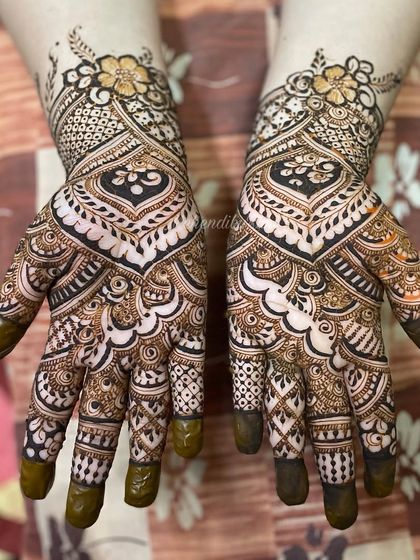 Intricate Full Hand Mehendi photo 30