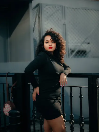 A duplicate of image 391, this moody portrait captures a sophisticated and slightly edgy fashion look on the streets of Bangalore.