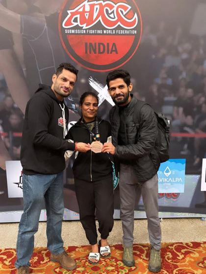 The team celebrating a medal win at ADCC. This is what it's all about: supporting each other through the grind and celebrating the victories.