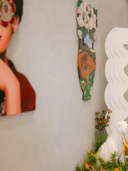 Another angle of the welcome area, showing how we blend quirky art with our themed decor for a cohesive and stylish look.