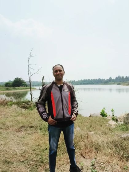 Standing proudly by the lake after a thrilling ride. The combination of adrenaline and serene natural beauty is what makes this experience so unique.