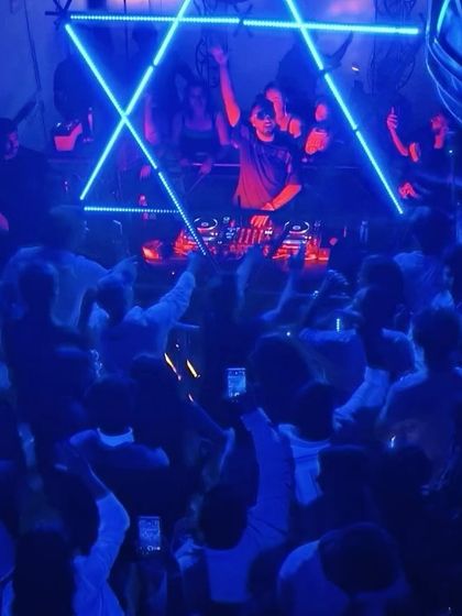 The crowd with their hands up at The Fixx.