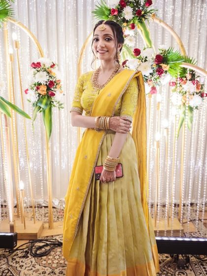 This soft makeup look is all about letting natural beauty shine through. The finish is flawless and elegant, perfect for a daytime wedding event.