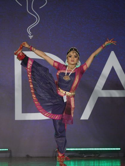 Showcasing incredible flexibility and balance, this student's performance earned her a 2nd place award in the open category.