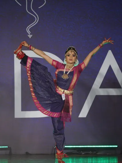 Showcasing incredible flexibility and balance, this student's performance earned her a 2nd place award in the open category.