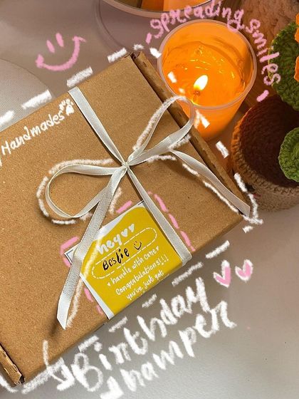 A birthday hamper all packed and ready to go! Every box I send out is meant to feel like a special event, tied with a ribbon and a personalized "Hey Bestie" sticker.