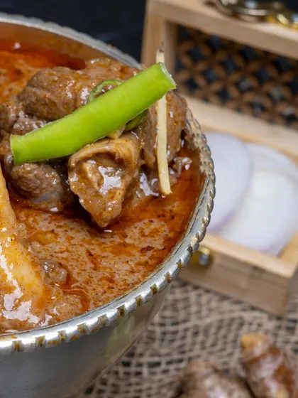 Our Nalli Nihari, a dish that is slow-cooked with passion. The bone marrow melts into the gravy, creating an unmatched depth of flavor.