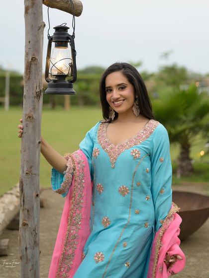 Another look from the same campaign. The makeup is simple and clean, perfect for showcasing the traditional outfit.