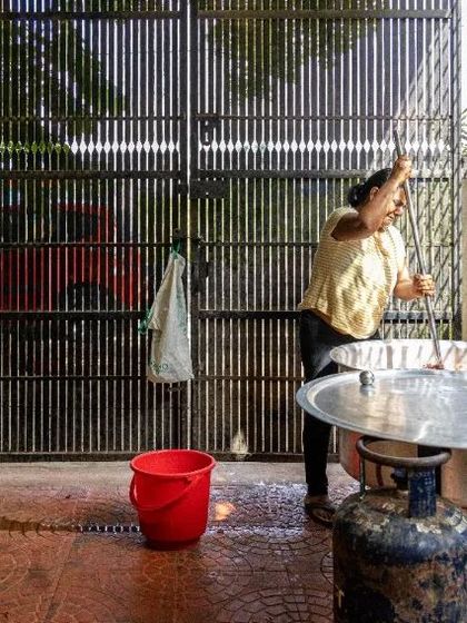 Cooking in large pots, this is the scale of our daily feeding operation. It's a huge effort, and we rely on your support to keep it going.