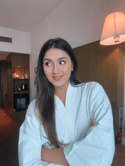 Ms. lovergirl. A relaxed, happy selfie in a bathrobe during a weekend staycation.