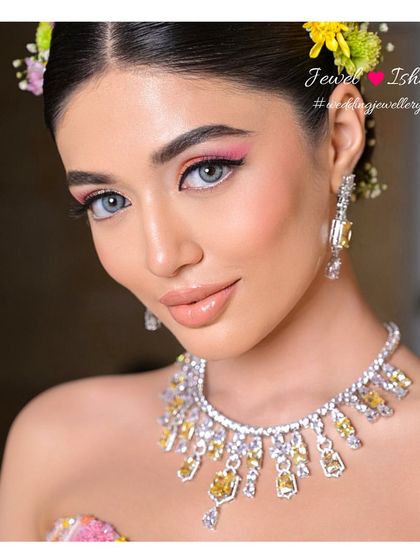 A close-up of the yellow diamond necklace. The unique colour of the diamonds makes this a standout piece, perfect for the bride who wants something a little different for her pre-wedding events.