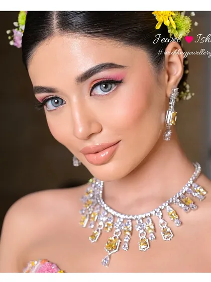 A close-up of the yellow diamond necklace. The unique colour of the diamonds makes this a standout piece, perfect for the bride who wants something a little different for her pre-wedding events.
