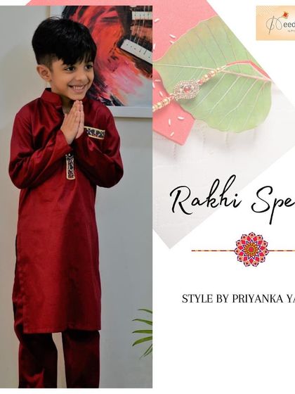 A respectful namaste from a happy client in his custom maroon silk kurta. This image captures the pride and joy a well-fitting traditional outfit can bring to a child during festive moments.