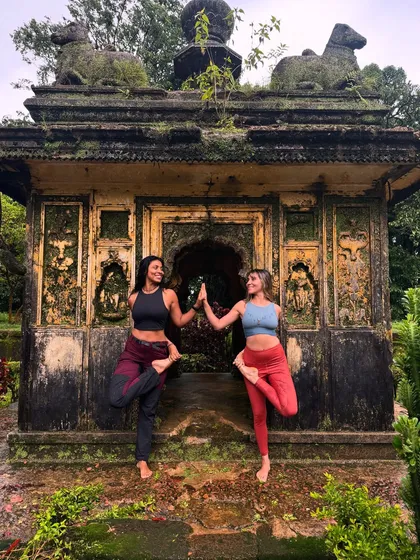 Yoga is about connection, with yourself and with others. Here, I share a moment of balance and friendship in a half-lotus pose in front of a beautiful, ancient temple. My retreats are a space where you will meet your kind of people and grow together.