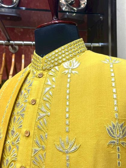 This jacket features delicate lotus motifs and pearl embellishments, showcasing our unique design language. Curate your own wardrobe with us.