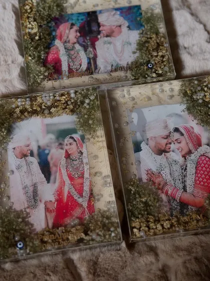 A set of three matching square frames, each with a different photo from the same wedding. This creates a lovely, cohesive story of the couple's day.