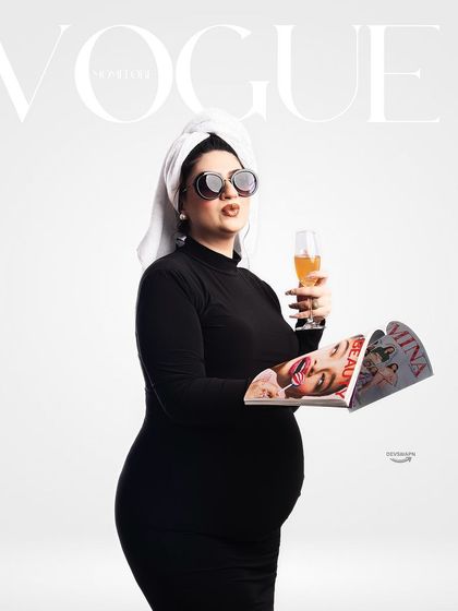 For the fashion-lover, a custom 'Vogue' cover shoot. This fun and creative concept adds a touch of high-fashion glamour and personality to the maternity session.