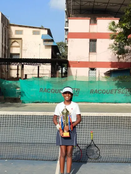 Celebrating Trisha Bhosale's first-ever U-10 win at the NMSA-MSLTA circuit tournament in Navi Mumbai.