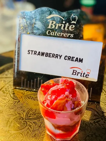A classic Strawberry Cream dessert, layered with fresh strawberries and cream, served in a glass.