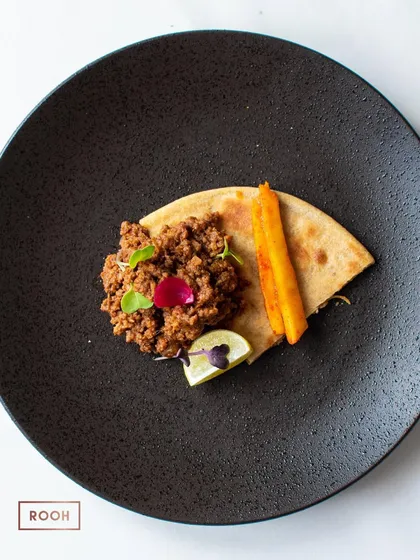 The rich, aromatic qeema served with a flatbread and a hint of citrus. This was a hearty and soulful dish from our special collaborative menu.