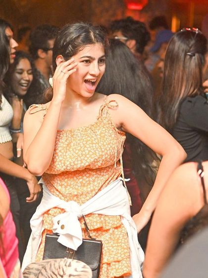 A partygoer having an amazing time at Badmaash.