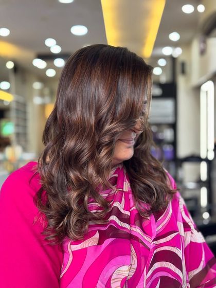 A candid moment with our client, loving her new Chocolate Mocha Mousse hair.