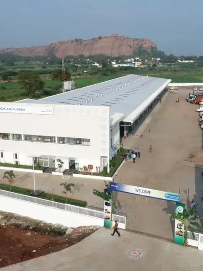 This aerial view captures the scale of the TVS Mobility - Ashok Leyland factory in Kodikulam, a project we designed for optimal logistics and manufacturing workflow. The facility is a testament to our expertise in large-scale industrial architecture.