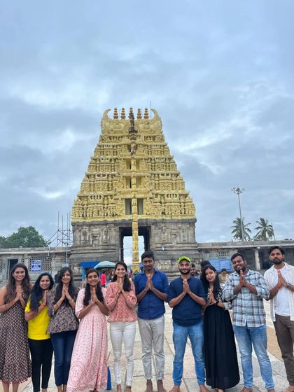 Our group paying respects at the Chennakeshava Temple in Belur, a cultural stop on our Kudremukha trip.