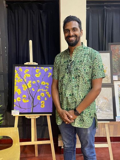 A proud moment, standing next to my painting at the Bhartiya Vidya Bhavan exhibition.
