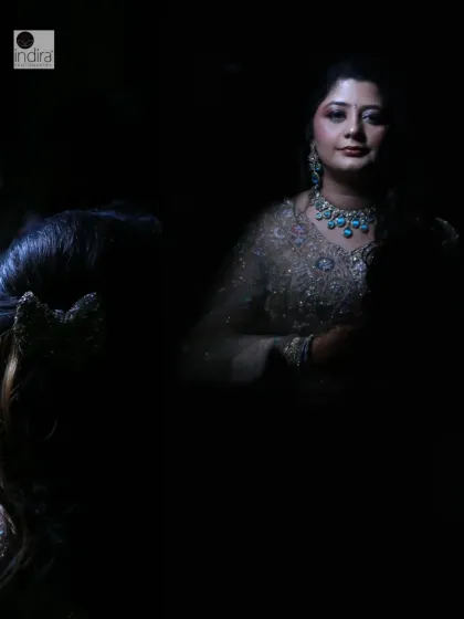 An artistic portrait of the bride using reflections and shadows. This creative approach to an engagement shoot results in a unique and memorable image that feels like a piece of art.