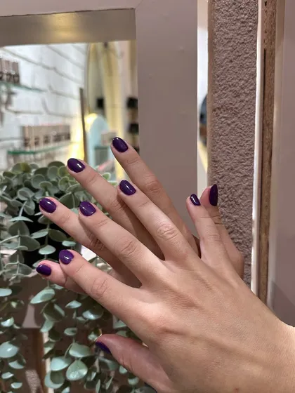 A deep, rich purple polish for a sophisticated and moody manicure. This color is perfect for the autumn and winter months.