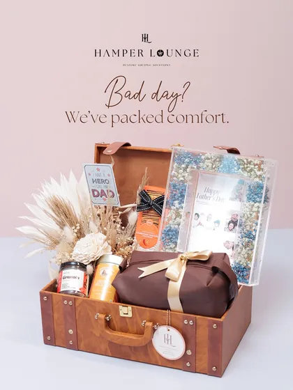 For Father's Day, I designed this hamper to feel like a box of pure comfort. Housed in a vintage-style leatherette trunk, it’s packed with his favorite snacks, brews, and self-care items, perfect for helping him unwind after a long day.