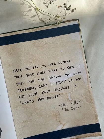 Another view of the finished quote page in my journal, showing the texture of the stained paper.