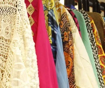A close-up of the different textures and patterns we work with, from delicate lace to vibrant prints. Quality material is the foundation of a great outfit.