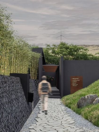 The entrance path to the SMGR Memorial is carved into the site's natural contours, flanked by gabion walls and bamboo groves. This part of the design defines the beginning of a journey from enclosed spaces to open ones, symbolizing struggle and release.