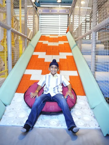 Get ready for our crowd favorite, the Donut Slide. Kids love the thrill of sliding down on these comfy tubes, and they always come back for more.