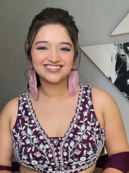 A beautiful smile from my happy bride. The colorful makeup perfectly matches her vibrant personality and the fun atmosphere of a pool party.