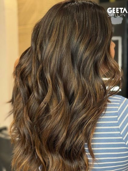 Another look at a balayage, showing how the lighter pieces are expertly woven through the darker base.