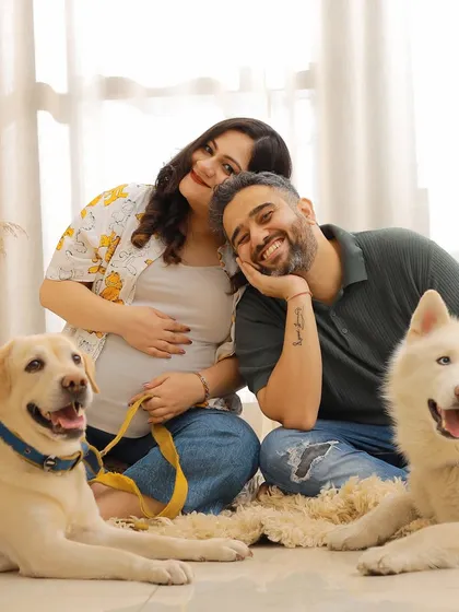 Your fur babies are family too. We love creating relaxed and joyful portraits that include everyone, capturing the excitement of the whole family as you wait for your new arrival.