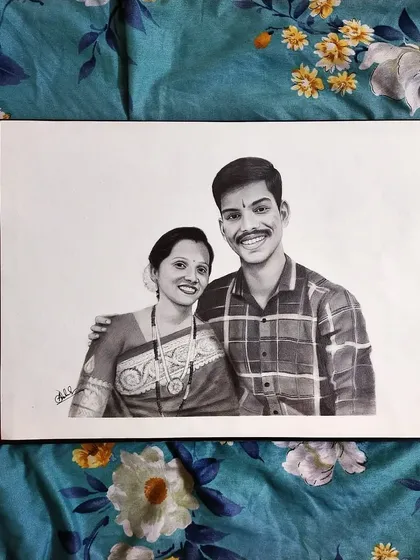Here is another view of the finished mother and son graphite sketch. The A3 size allows for plenty of detail in the expressions and clothing, creating a full and realistic portrait.