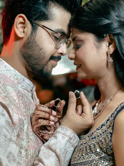 A repeat of the intimate ring exchange moment, a powerful symbol of love and commitment that deserves to be highlighted.