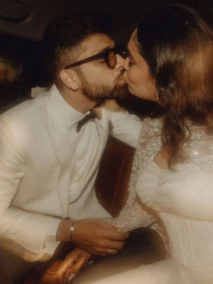 A stolen kiss in the car after a crazy engagement party. These are the intimate, cinematic moments I love to find.