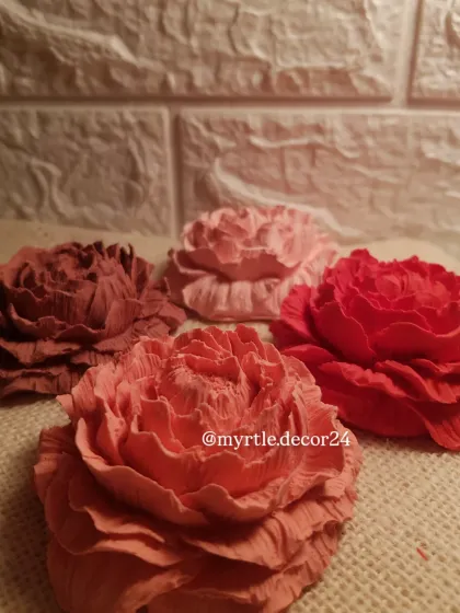 A closer look at the rich colors and textures of our Peony aroma diffusers. Each one is hand-poured and colored, making every flower unique.