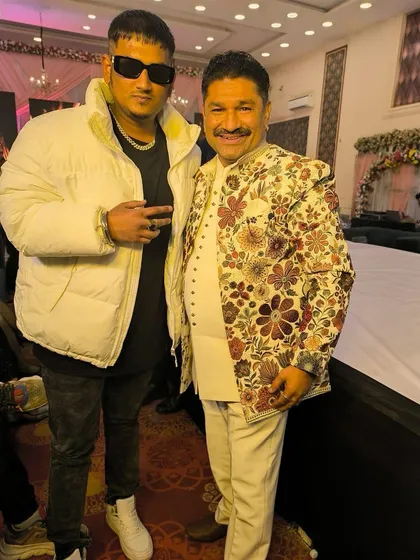 My floral embroidered jacket is a popular choice, seen here on another happy client. It’s a versatile piece that adds a touch of personality and flair to a traditional outfit.