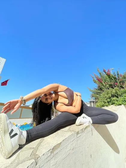 Morning stretches on vacation in Bodrum, Turkey. A simple side bend to wake up the body and start the day.